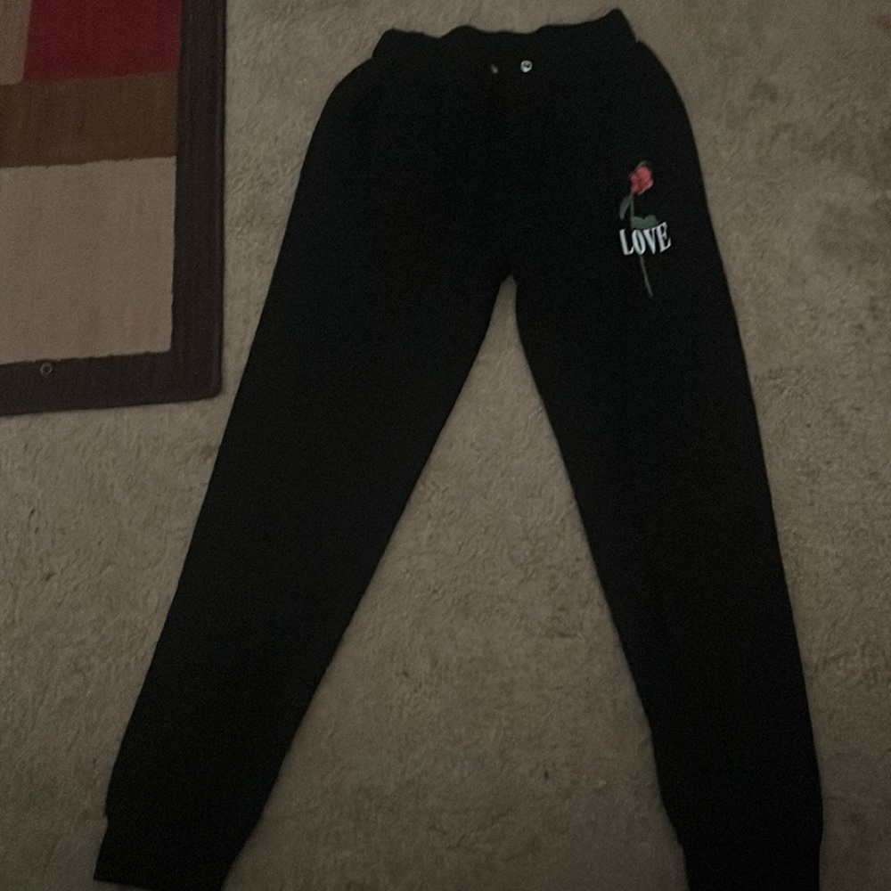 Black pants, worn, large, from ROMWE